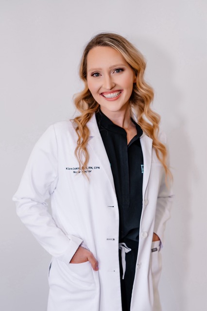 Female doctor with a big smile on her face